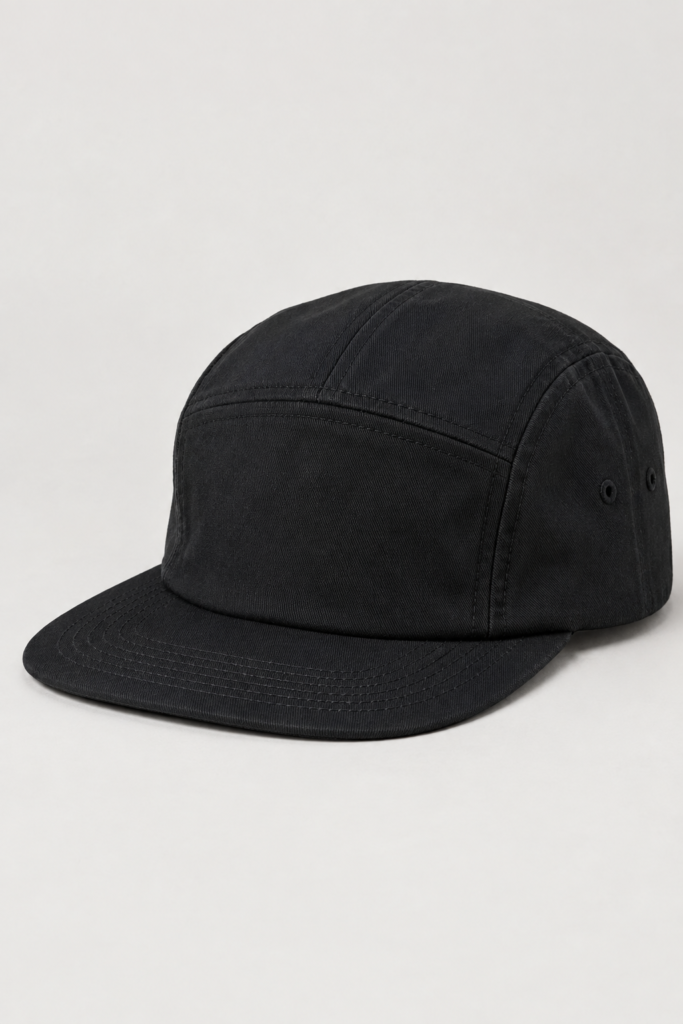 Black five panel cap showing boxy crown construction and flat brim
